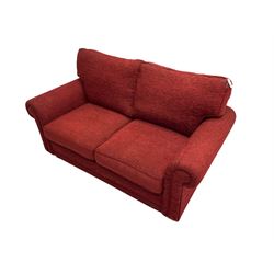 Two seat metal actions sofa bed upholstered in red cover