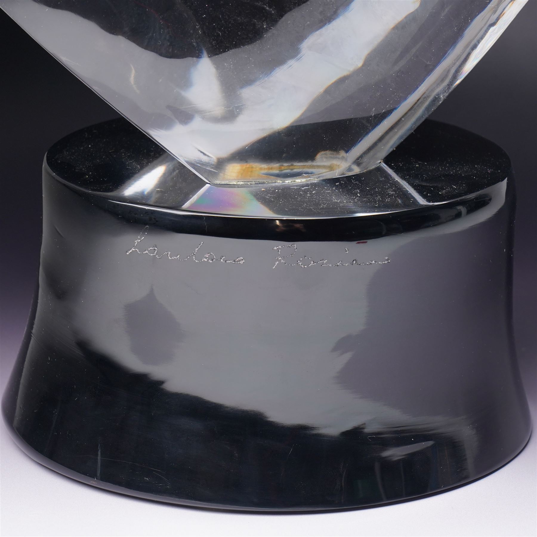 Loredano Rosin (Italian 1936-1992): Horse's Head, clear cut glass sculpture mounted on an oval plinth of black glass with incised signature, with impressed makers medallion, overall H35cm W47cm 
Notes: Rosin was widely exhibited Murano glassmaker who collaborated with artists such as Picasso and Chagall, this piece probably dates from the 1960s. 