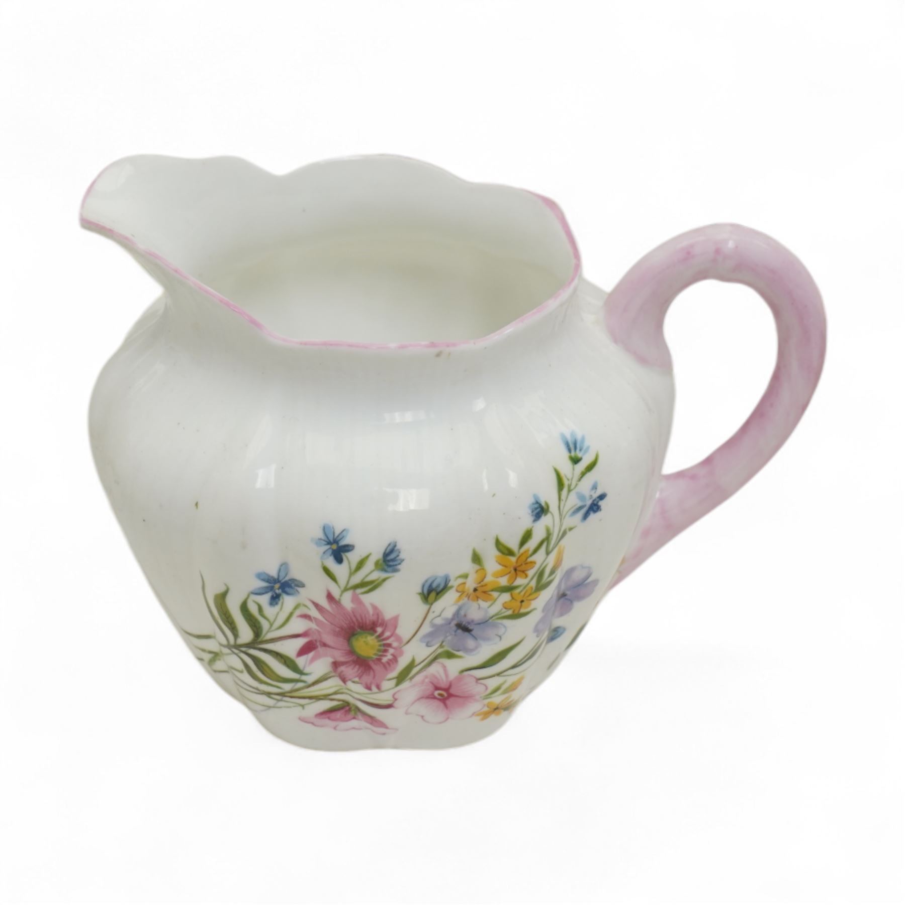 Shelley 'Wild Flowers' pattern part tea service, comprising four coffee cups, five coffee cup saucers, nine teacups, eight teacup saucers, coffee pot, three milk and cream jugs, two bowls, five cake plates etc