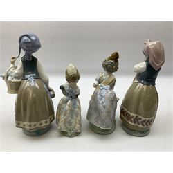 Four Lladro figures, comprising Miss Valencia no 1422, Girl from Valencia, Girl with Scarf no 5024 and Planning the Day no 5026, all with original boxes, largest example H18cm 