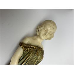 Demetre Chiparus (1886-1947): Innocence, a gilt bronze and ivory figure, circa 1925, standing in contemplative post with hands clasped, upon onyx plinth, signed to base, H24.4cm