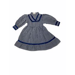 Heidi Ott doll in tartan dress, navy floral dress with white lace and ribbon detailing, striped blue and white dress and a 'Head to Toe' book