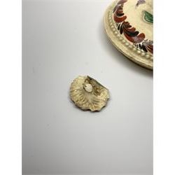 18th century creamware teapot, probably Leeds, with reeded entwined handle and floral finial to the cover, the body with hand painted polychrome decoration of figure to one side, and floral spray to the other, collectors paper label beneath inscribed Leeds Pottery, H11.5cm