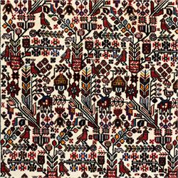 North west Persian Rudbar hand-knotted rug, ivory field woven with a repeating pattern of stylized shrubs, rosettes, and geometric floral motifs in tones of madder red, turquoise, indigo, and ochre, enclosed by a border of linked rosettes and angular flowerheads between narrow guard stripes 