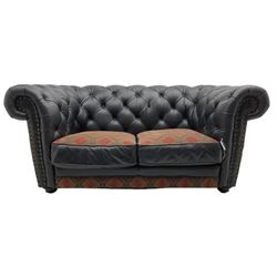 Barker and Stonehouse - chesterfield two seat sofa, upholstered in buttoned black leather and red and green geometric pattern fabric, with scatter cushions, studded detail 