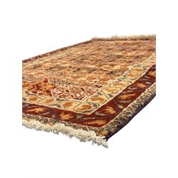 Persian Heriz wool rug, red and ivory field with floral medallion, geometric spandrels, and floral border (157cm x 107cm); Kurdish Shairwan wool rug, red and navy field with three medallions, geometric crosses and serrated border (200cm x 155cm); Persian Qashqai wool rug, golden-yellow field with boteh motifs and wide floral border (127cm x 82cm)