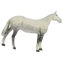 Five Beswick horses, including Skewbald Pinto no 1373, Dartmoor 1642, Dunn Highland no 1644 etc