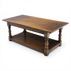 Oak coffee rectangular table, in the manner of Titchmarsh & Goodwin, raised on turned supports united by a full length undertier