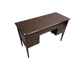 Hardwood kneehole dressing table or desk, fitted with five drawers, on square tapering supports 