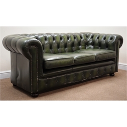  Three seat Chesterfield sofa, upholstered in deep buttoned green leather, W190cm  