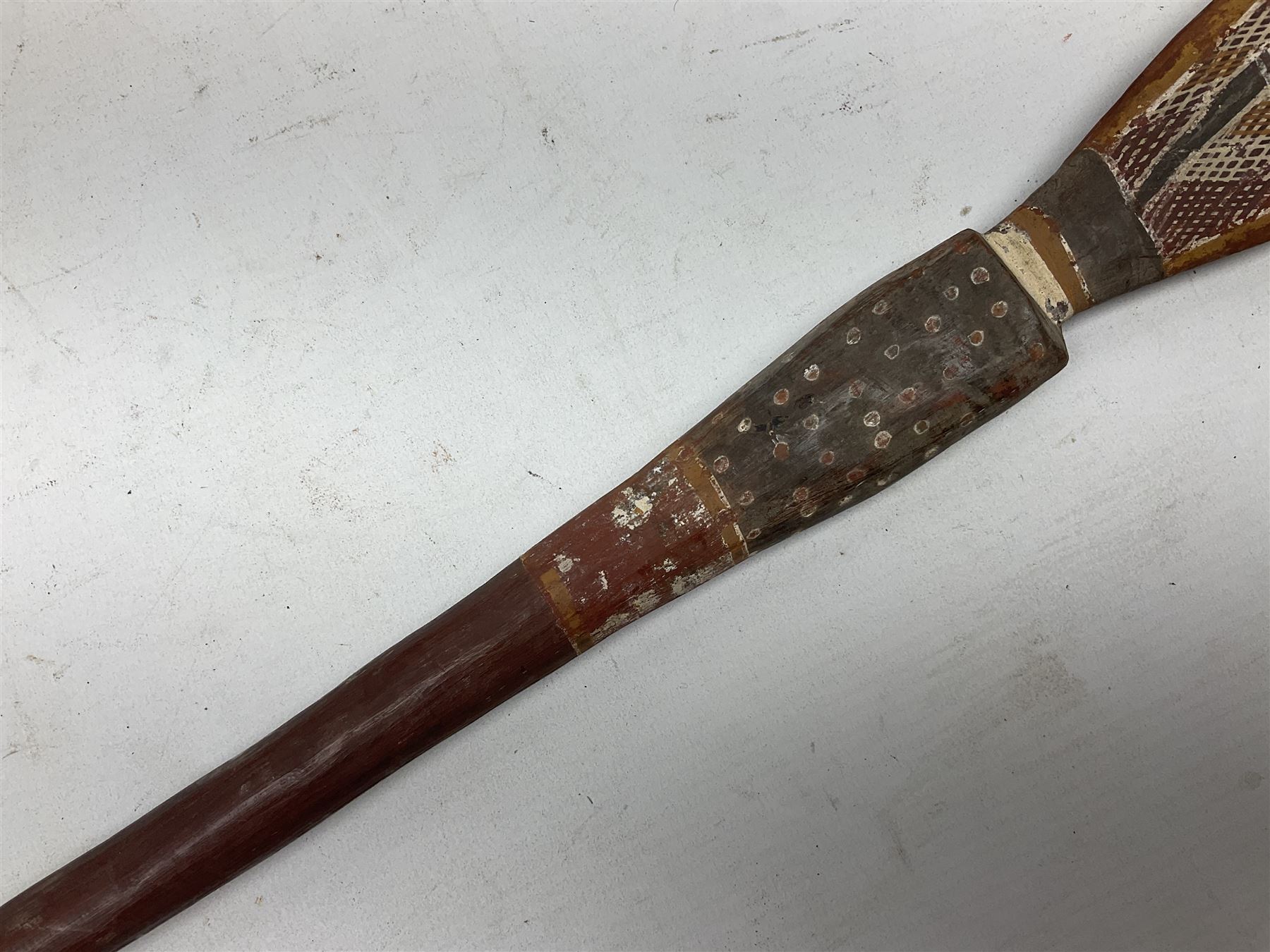 Australian Aboriginal shield, carved with Kangaroo and Emu, 74.5cm; Spear painted with aquatic creatures 78cm, and Spear thrower 81cm (3)