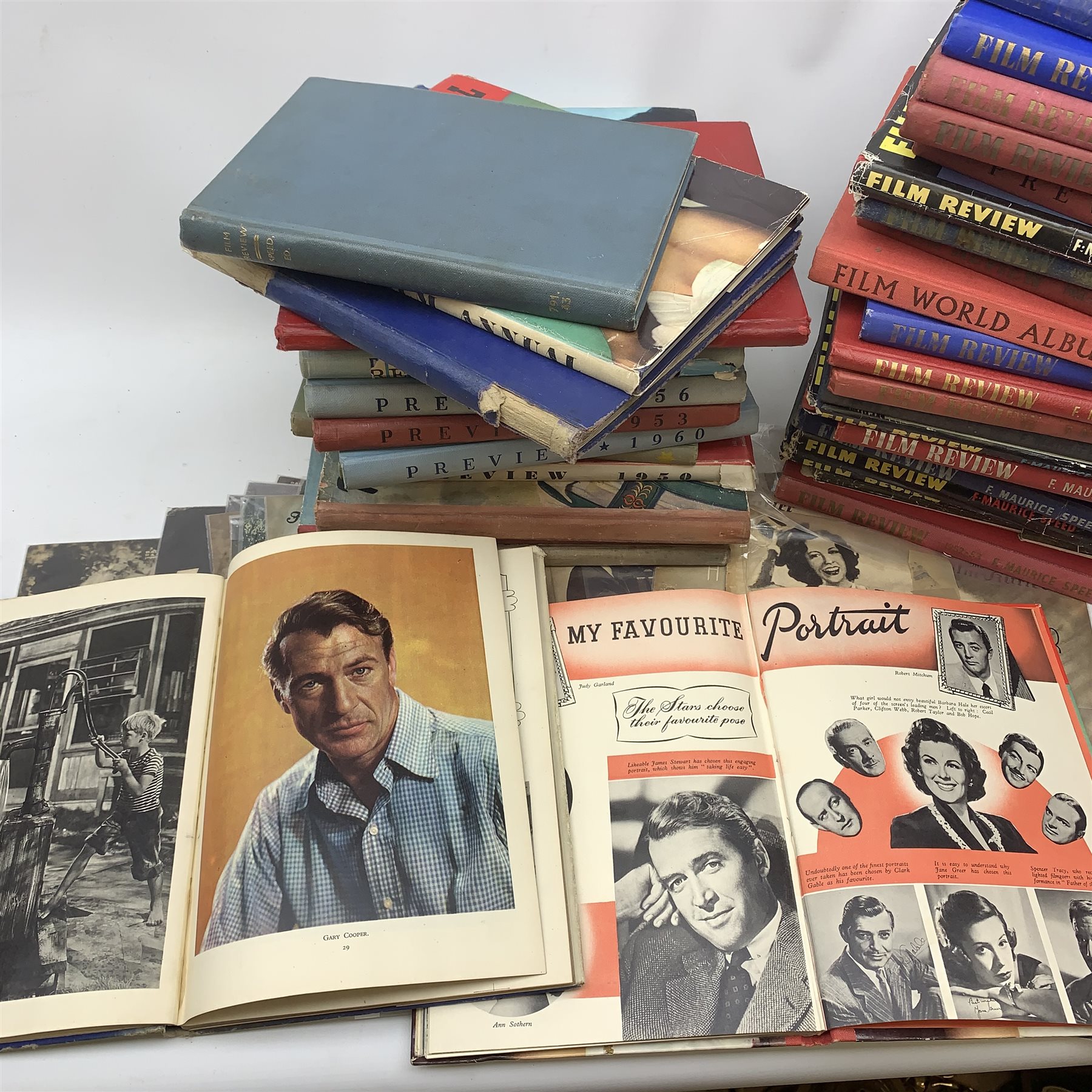 A collection of various Vintage Film/Hollywood magazine reviews, together with various Vintage Film/Hollywood books, including twenty four Film Review by F Maurice Speed examples, Film World Album, The Film Show Annual, Picture Show Annual, Film Portraits, etc. 