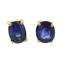 Pair of 18ct gold sapphire earrings, each stud set with a single oval cut sapphire, total ...