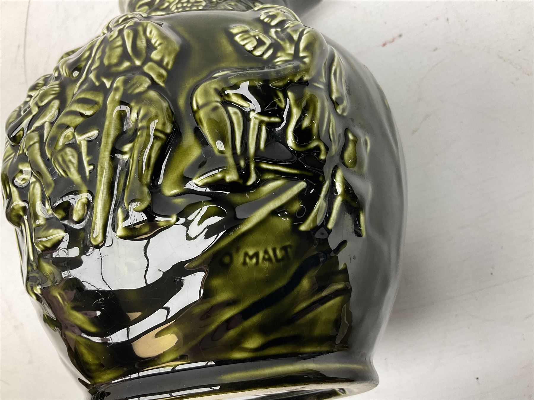 Three jardinières comprising West German Gerz example decorated in relief, Doulton Slaters example with frilled everted rim and a majolica example, and a further two Arthur Wood majolica jugs (5)