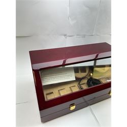Electronic watch winder for three watches, in laminated mahogany finish, H24cm, W54cm