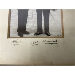 Albert (later George VI) and Edward (later Edward VIII) - postcard size full length photograph of the two Princes in Royal Naval College Osborne uniform aged about fifteen and sixteen; marked Kirks Cowes; framed with contemporary mount signed by each brother and dated 1910, 12 x 8cm
