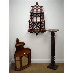  Late Victorian walnut corner cabinet, bevelled mirror glazed enclosed by single door (W58cm, H83cm) a far eastern style tracery pierced hanging wall rack, and a jardiniere stand (3)  