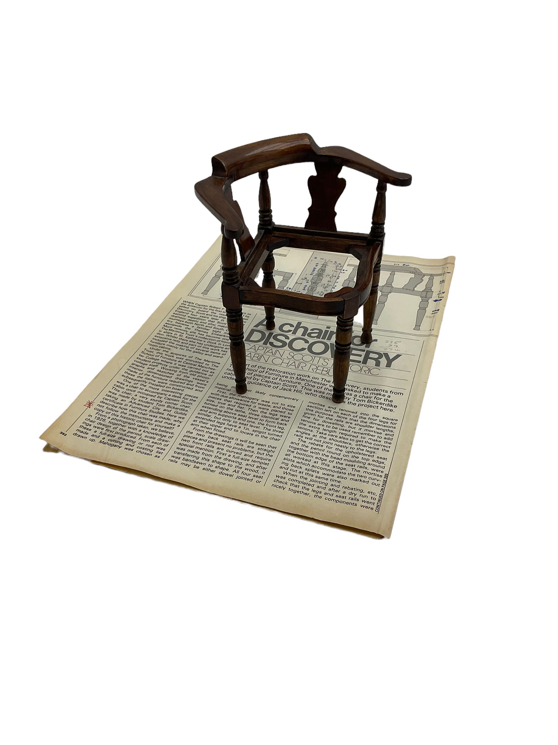 Captain Scott replica mahogany cabin chair, corner shaped with studded leather seat, with miniature prototype and paperwork