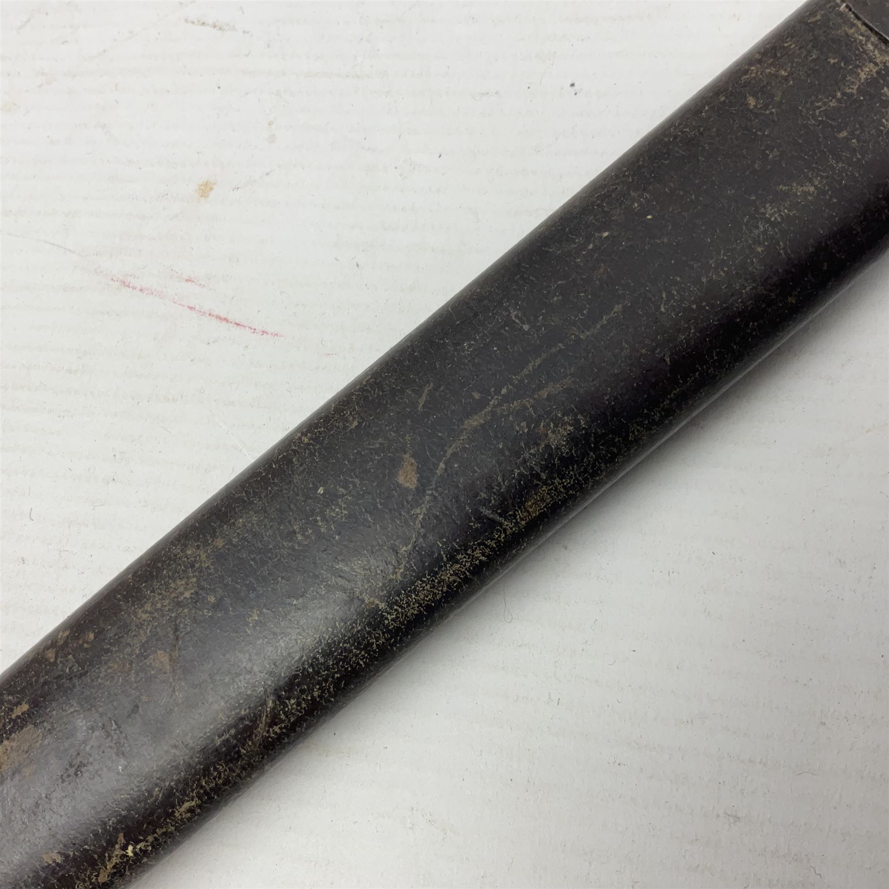 British Pattern 1888 knife bayonet, the 30.5cm double edged blade with raised central medial ridge; in leather covered scabbard L40.5cm overall