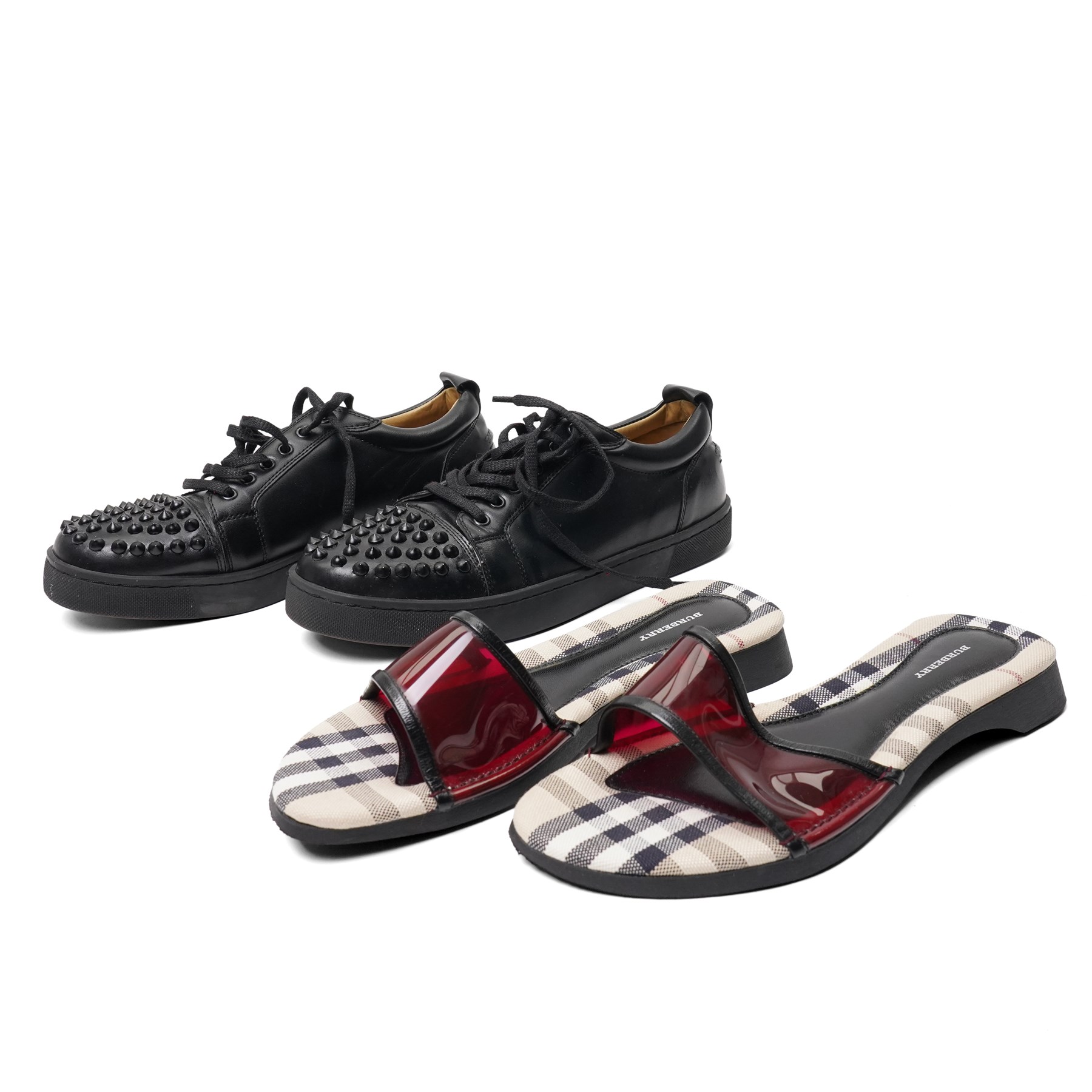 Christian Louboutin and Burberry - two pairs of designer shoes, comprising black leather Christian Louboutin low-top sneakers with black spike-studded toe caps and signature red soles, size 40, with dust bag, together with Burberry check canvas and red transparent strap sandals, size 39, with box and dust bag (2)