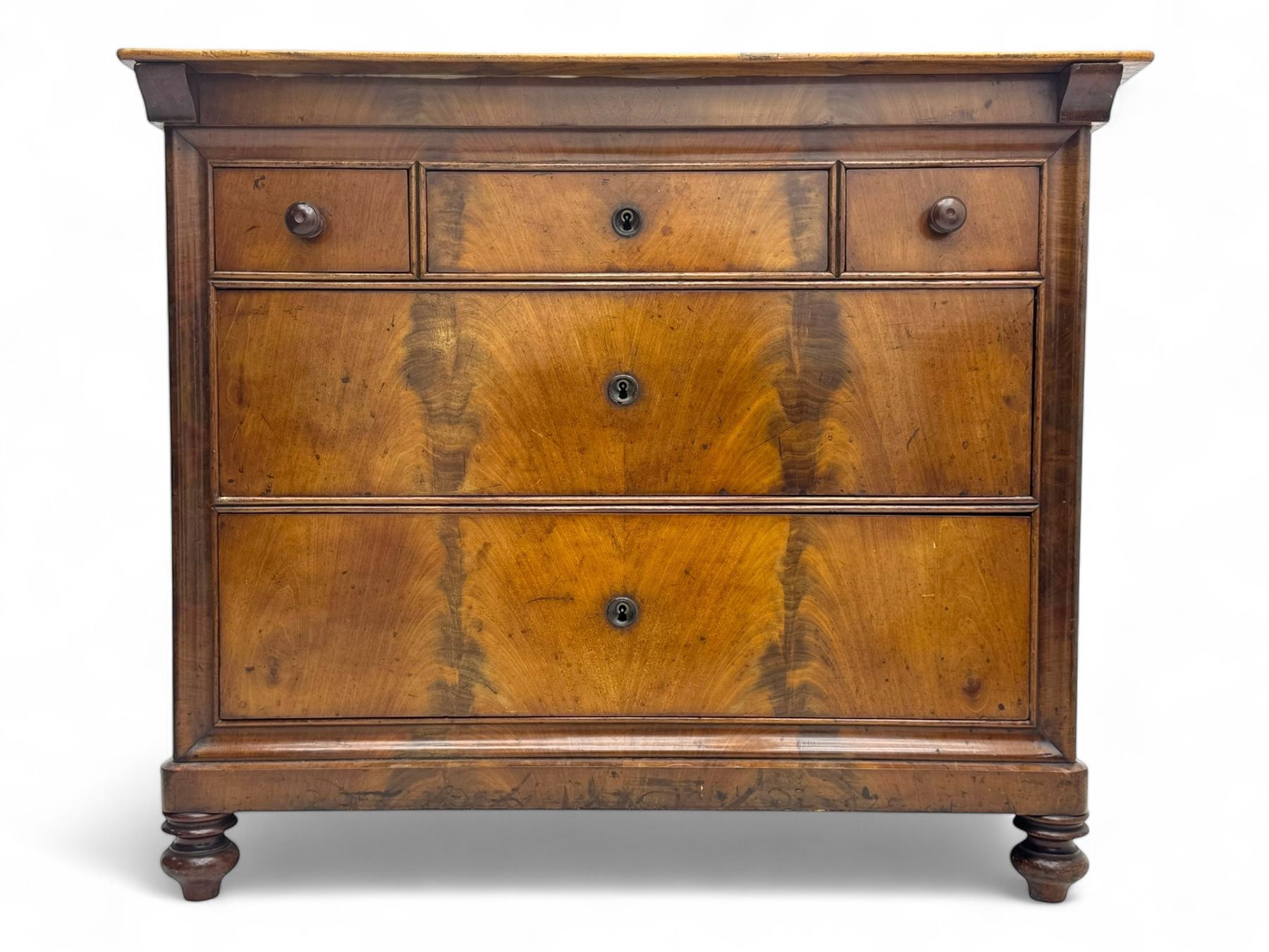 19th century French figured mahogany and walnut chest, rectangular top over three short and two long drawers, on turned feet