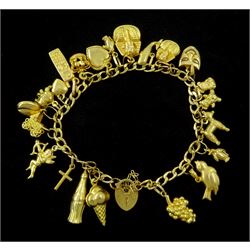 9ct gold charm bracelet including ice cream cone, bird, coca cola bottle, poodle and whale