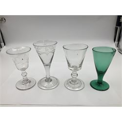Three mid 18th century wine glasses, comprising bucket bowl upon stem with medial ball knop and folded foot, ogee bowl engraved with barley upon balustroid stem and domed foot, and bell shaped bowl engraved with fruiting vine upon knop stem, together with two late 18th/early 19th century slice cut glasses and Edwardian wine glass, the funnel bowl wheel engraved with grape vines and tendrils, and four similar furthers, tallest H24.5cm (10)