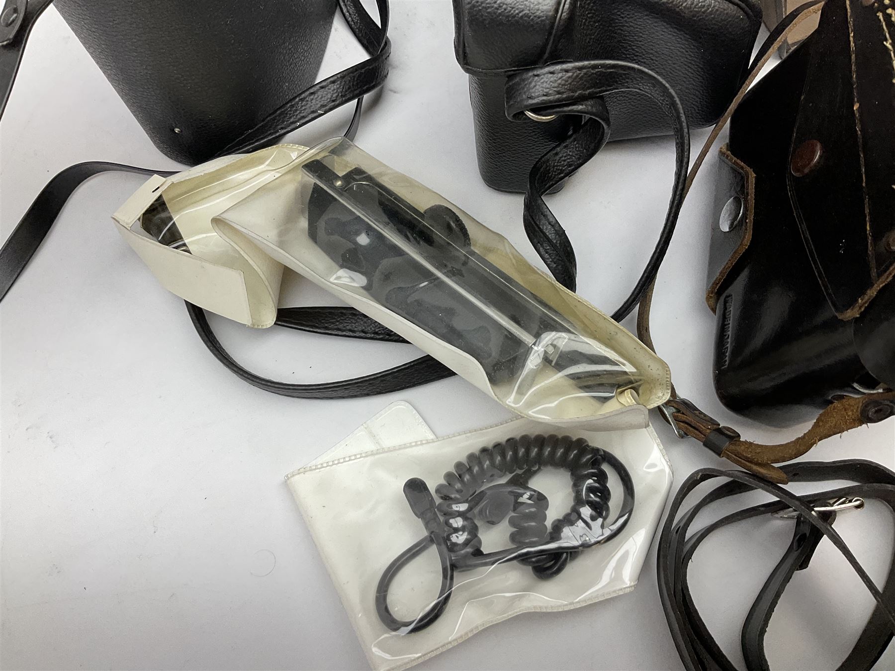 Quantity of Cameras , Lenses and Table Top Viewer- To be assessed 
Collection of cameras, lenses and photography equipment, to include Praktica EE2, Kowa SE, Kodak 66 model II, Inovar, lens Carl Zeiss Jena DDR Flektogon 2.4/35, lens Pentacon Electric f/2.8 135mm, Sunpak auto 2020, tripod  etc, together with a pair of Mark Scheffel 10x50 field binoculars.  