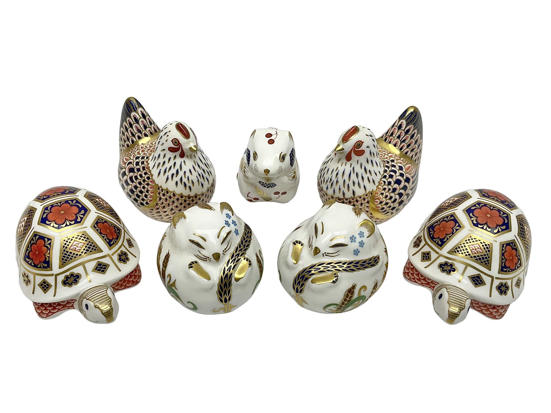 Seven Royal Crown Derby Paperweights, to include Field mouse with silver stopper, Dormouse, Chicken etc,  six without stoppers   