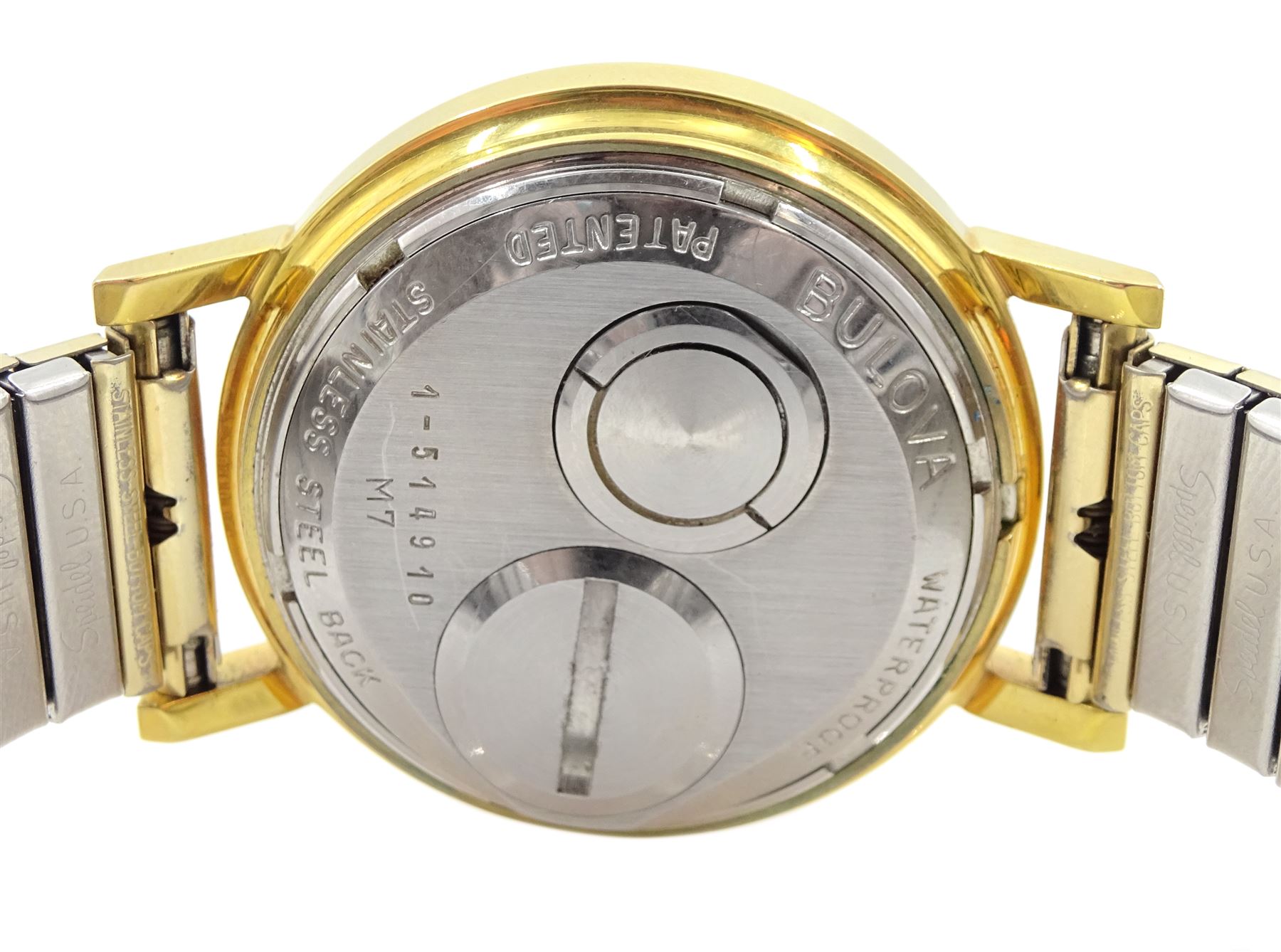 Bulova Accutron gold-plated and stainless steel gentleman's quartz wristwatch, No. 1-514910 M7, hands adjusted from the back, on expanding strap