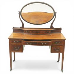 Edwardian mahogany dressing table, rectangular top above a central kneehole drawer flanked...