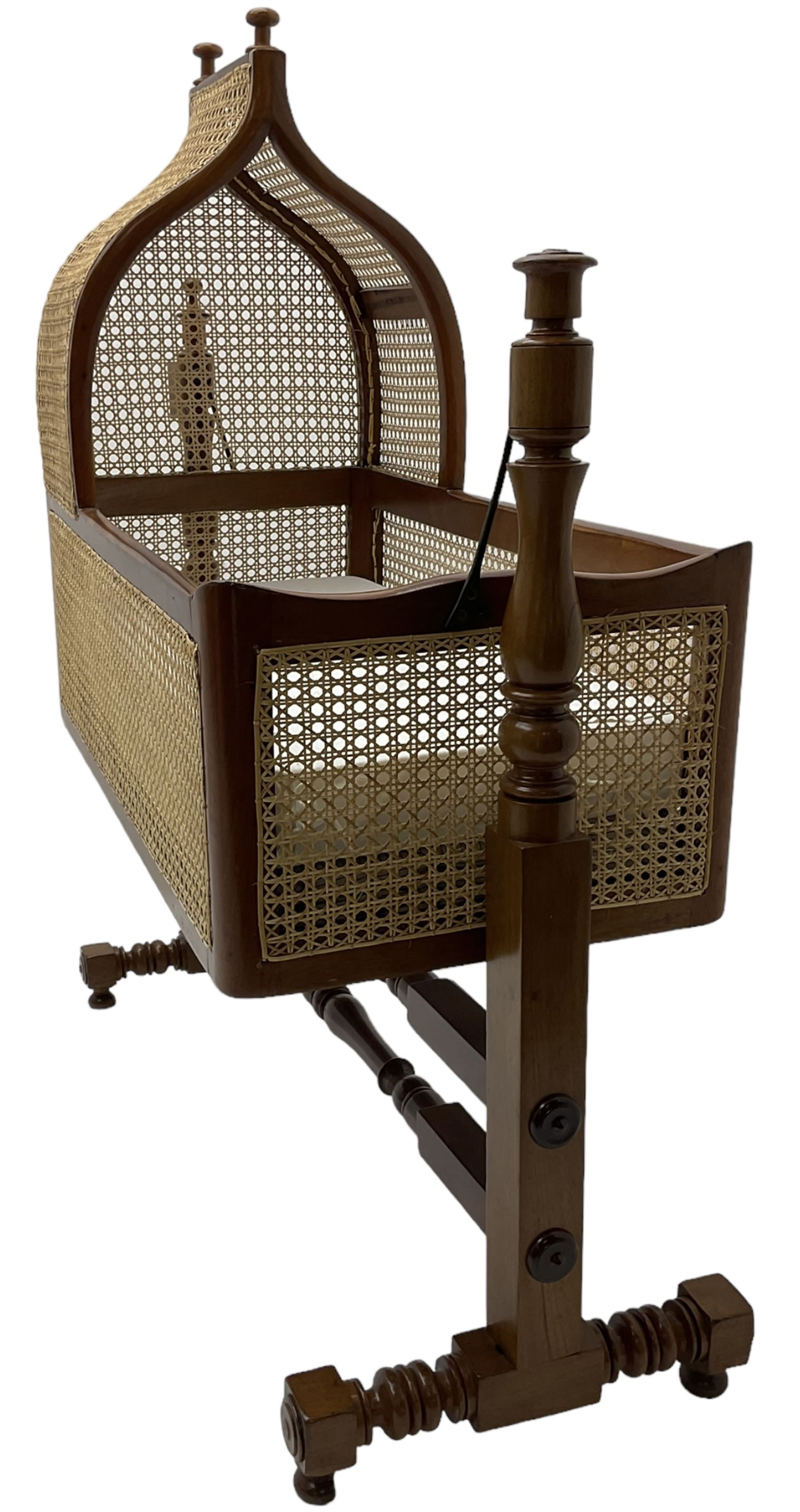 Victorian mahogany rocking crib, canework canape hood and sides