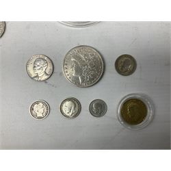 Coins including United States of America 1885 Morgan dollar, Queen Elizabeth II Bailiwick of Guernsey 20012 and 2013 five pound coins, Isle of Man Paddington Bear 2008 one crown, various other commemorative coins etc