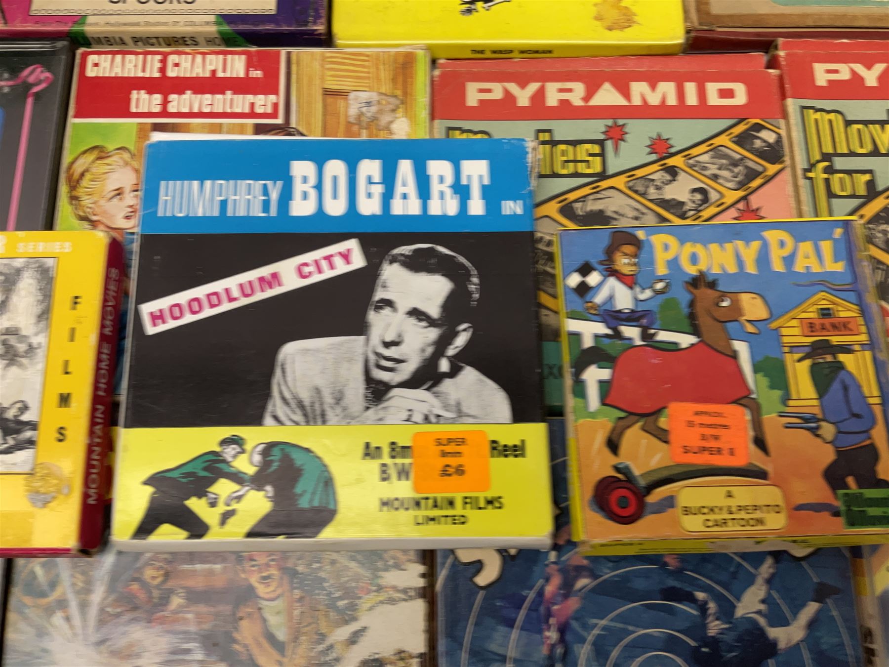 Film reels, mostly 8mm, to include Charlie Chaplin, Laurel & Hardy, The 3 Stooges, Spartacus the Gladiator etc 