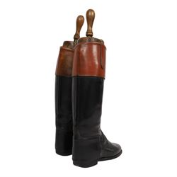 Pair of brown leather topped riding boots, with wooden shoe trees