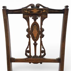 Quality Edwardian seven piece inlaid salon suite, comprising three seater settee, pair of arm chairs and four chairs with pierced splat backs, upholstered in pale pink fabric, inlaid with flowering urns, upon tapering legs with spade feet and castors