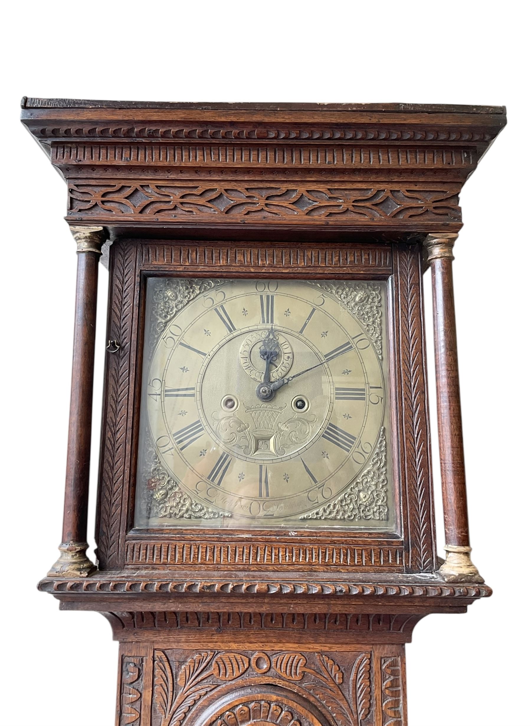 Robert Henderson of Scarborough -mid-18th century eight-day longcase clock c1750, with a flat topped pediment and broad cornice, carved frieze beneath and a square hood door flanked by detached pilasters with gesso capitals, profusely carved trunk with a break arch topped door on a square plinth raised on a shaped base, brass dial with a matted and engraved dial centre, cast spandrels and chapter with Roman numerals and five minute Arabic's, with a seconds dial and date aperture, dial pined directly to a rack striking movement with a recoil anchor escapement, sounding the hours on a bell. With weights and pendulum.
Robert Henderson was one of the first clockmaker recorded as working in Scarborough, b1678-d1756.

