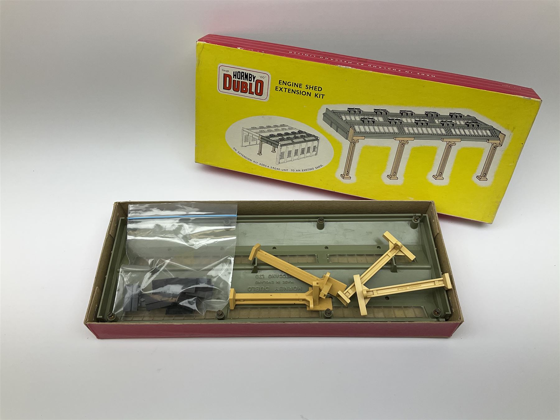 Hornby Dublo - 5006 Engine Shed Extension Kit; 5085 Suburban Station Kit with instructions; and 5030 Island Platform Kit; all in pictorial boxes; and Goods Depot Moulded Kit in box base only (4)