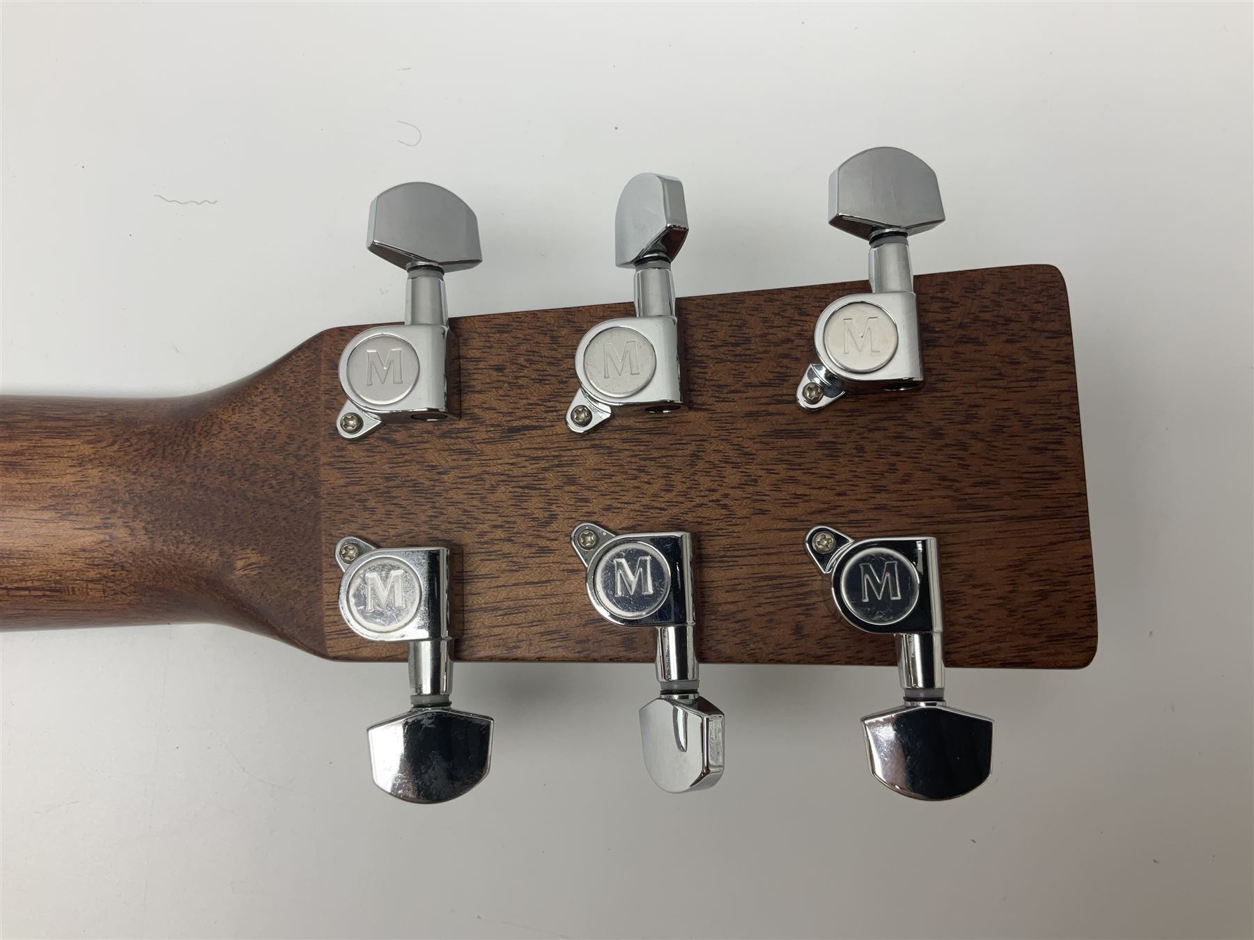 Sigma GMC-1E semi-acoustic guitar with cut-away body, sapele mahogany back and ribs and solid spruce top; bears label Model GMC-1E serial no.210522747; L103cm