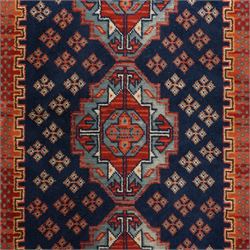 North West Persian Heriz hand-knotted rug, indigo field with three central stepped geometric medallions arranged vertically, enclosed by angular spandrels and multiple geometric borders in shades of madder red, ivory, and pale blue, with cotton fringe ends  