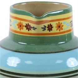 Hartrox Stoneware, comprising five jugs and two bowls, all with green, blue, yellow and oragne floral and abrstact decoration, with printed marks beneath, tallest H26cm
