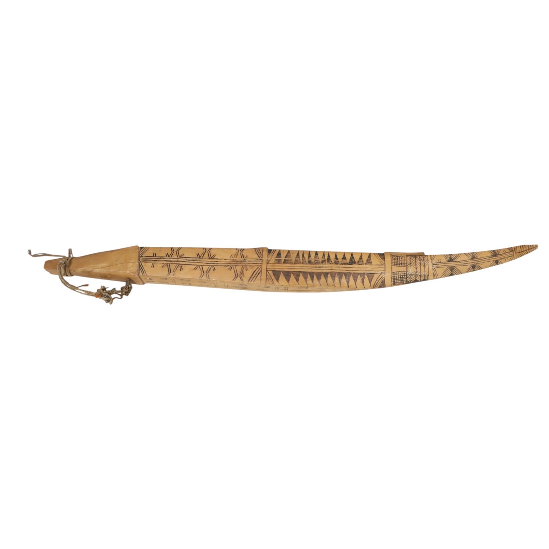 Papua New Guinea tribal fishing spears, together with carved boat 