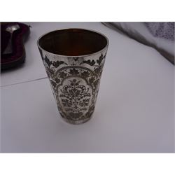 Victorian silver four piece christening set, comprising a beaker mug, napkin ring, fork and spoon, with bright cut floral decoration and monogrammed initials to each item, mug hallmarked Mappin & Webb (John Newton Mappin), Sheffield 1884, within tooled leather fitted case