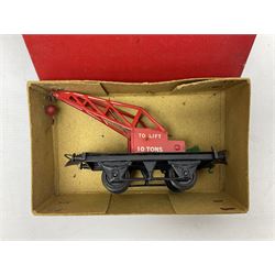 Hornby '0' gauge - twelve goods wagons including lumber wagon, tank wagon, cattle truck, cement wagon, goods brake van, flat truck etc; all boxed but three in associated boxes; together with No.1 Crane Truck and No.1 Water Tower; both boxed (14)