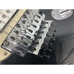 Mexican Fender Stratocaster electric guitar in black c2003 with Floyd Rose tremolo system, serial no.MZ3129600; L98cm; in Freestyle fitted case with 2006 Diamond Anniversary booklet