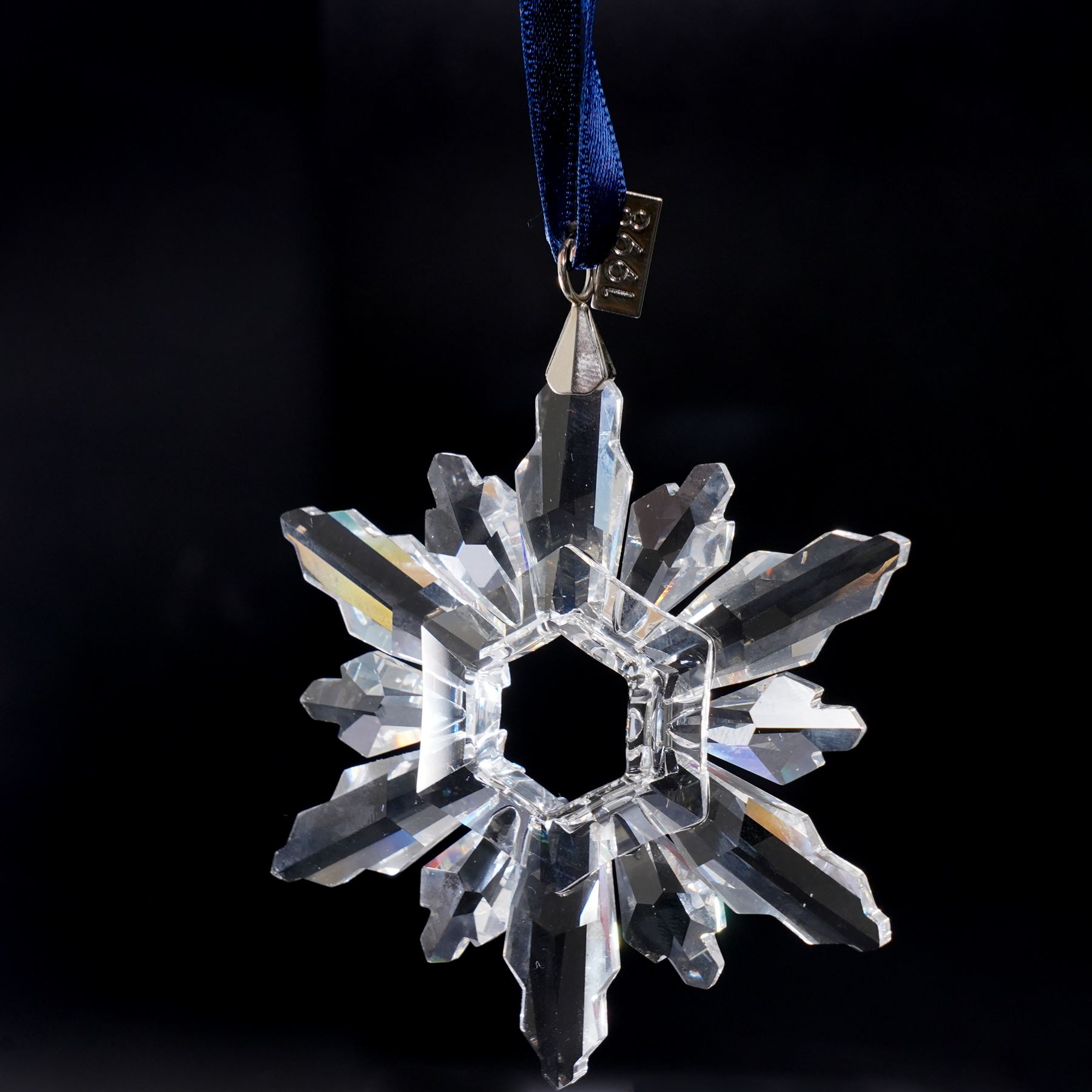 Eight Swarovski crystal snowflake Christmas ornaments, comprising years 1991-1998, some with certificates, boxed (8)