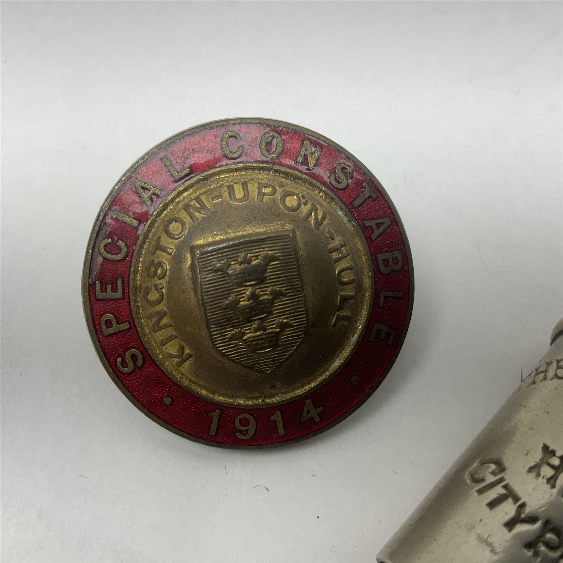 Bosun's whistle, together with Hull City Police whistle and brass and enamel badge detailed 'Special Constable Kingston Upon Hull 1914', (3)