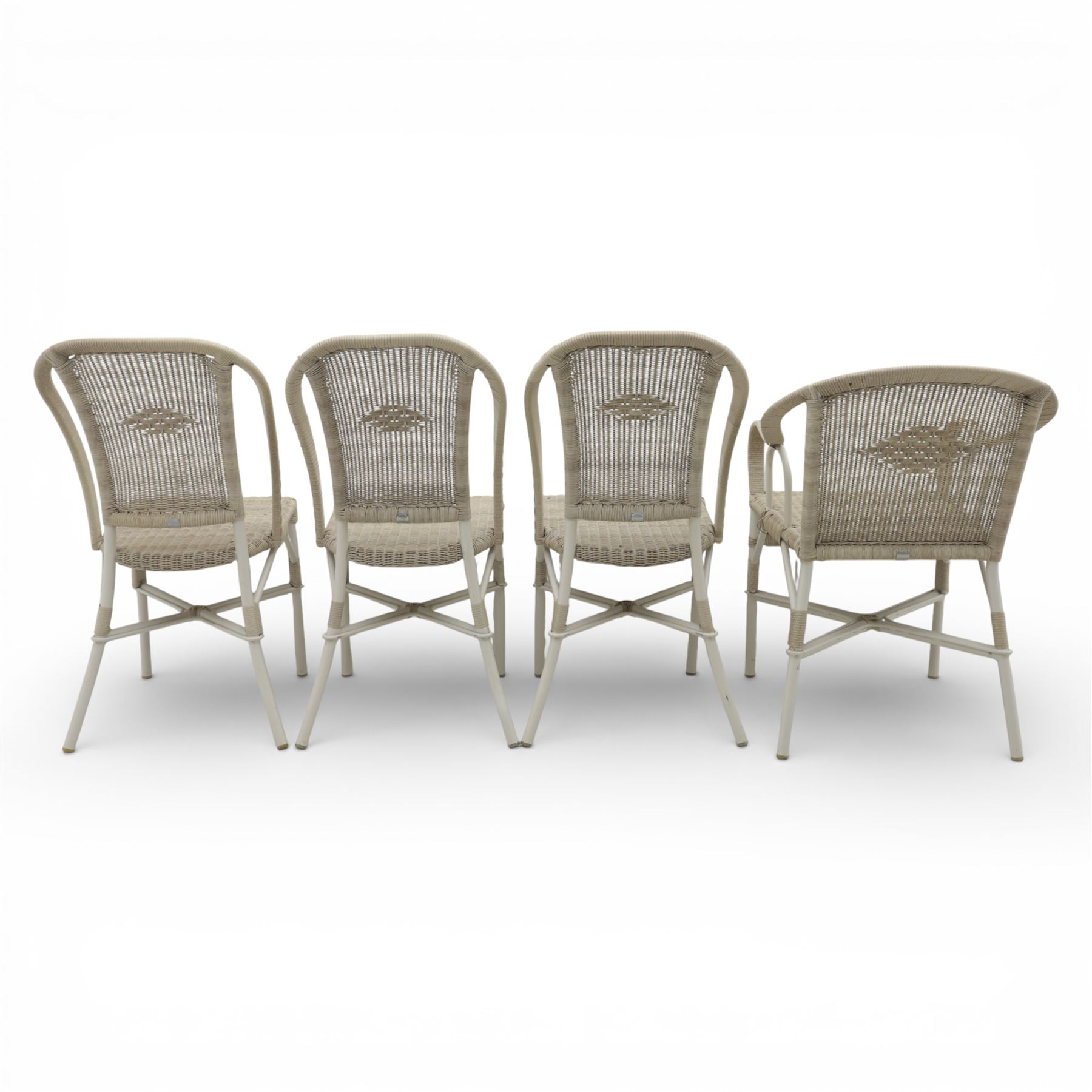 Kok Maison - 20th century French wicker chairs, set of eight including two carvers, with arched woven backs and seats in close cane weave, the frames painted cream, the arms with wrapped wicker detail, raised on turned supports united by cross shaped stretchers