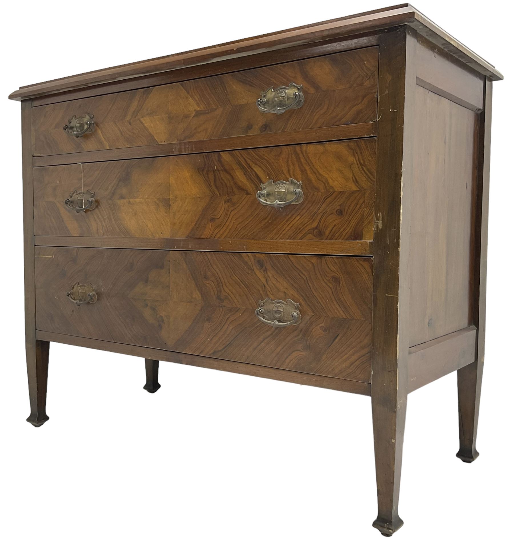 Early to mid-20th century walnut chest, fitted with three graduating drawers with bookmatch veneer facias, raised on square tapering supports