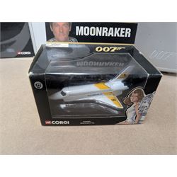 James Bond DVD collection, housed in a 007 collectors briefcase, together with Corgi The Definitive Bond Collection Film Canister 4 Piece Set CC99106, Corgi James Bond Space Shuttle CC04001 and a Vanguard RAC special limited edition diecast model set, all boxed